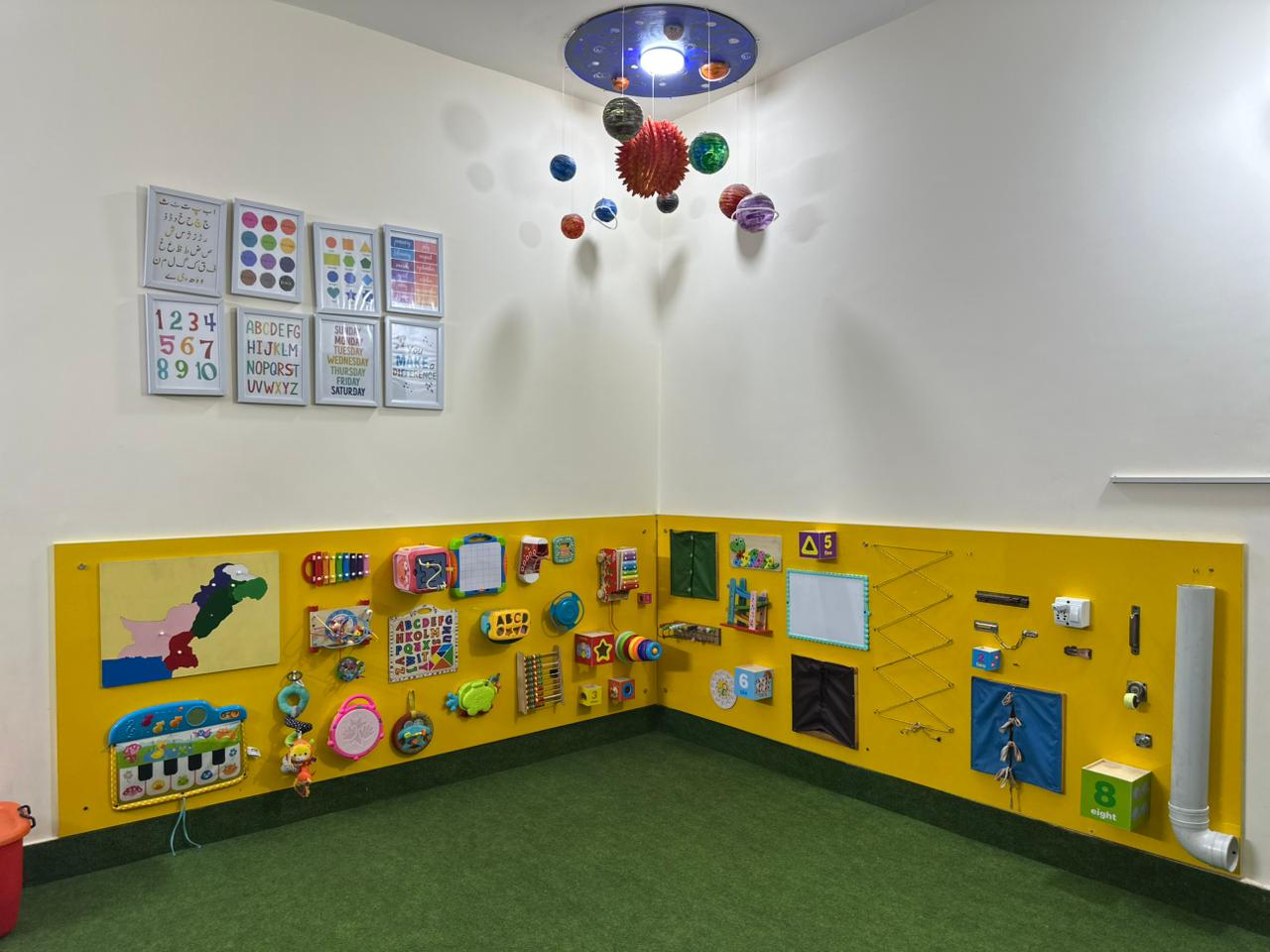 Children engaged in hands-on play at Global Kids Campus Montessori Daycare Lahore