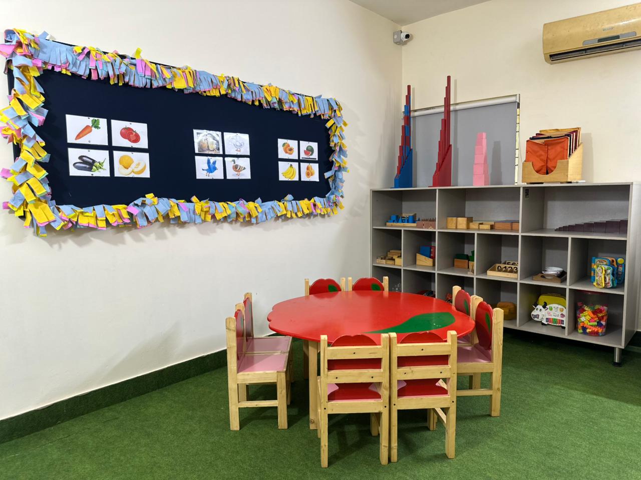 Qualified Montessori teachers guiding children in a small intimate classroom at Global Kids Campus Lahore